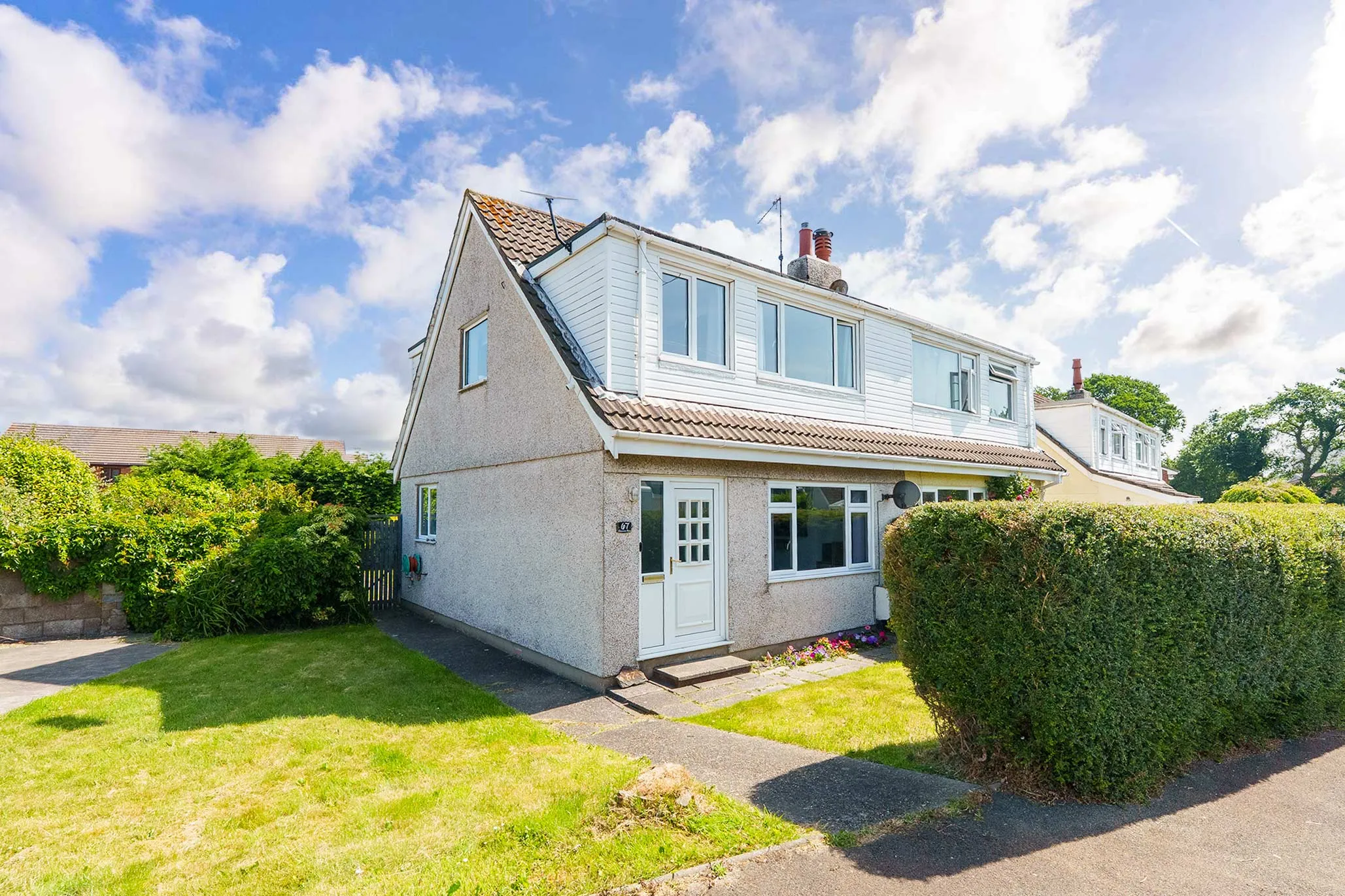 Family Home Occupying a Large Corner Plot